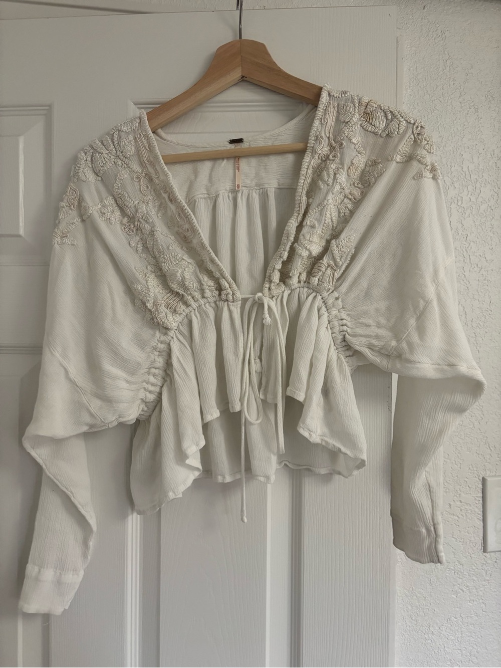 Ivory Free People embroidered tie-front peplum top size XS